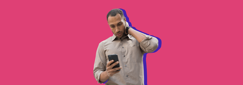 An older man with grey hair looking at his smartphone, set against a purple background.