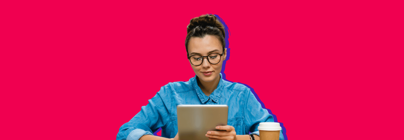 A woman in glasses using a tablet with a coffee cup beside her, set against a red background.