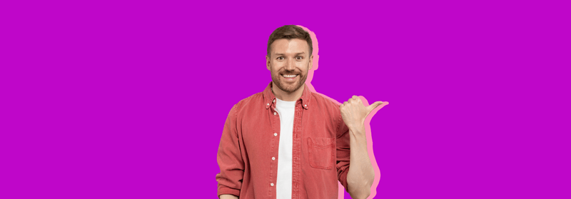 A smiling man in a checked shirt with one hand open in a presenting gesture, set against a purple background.